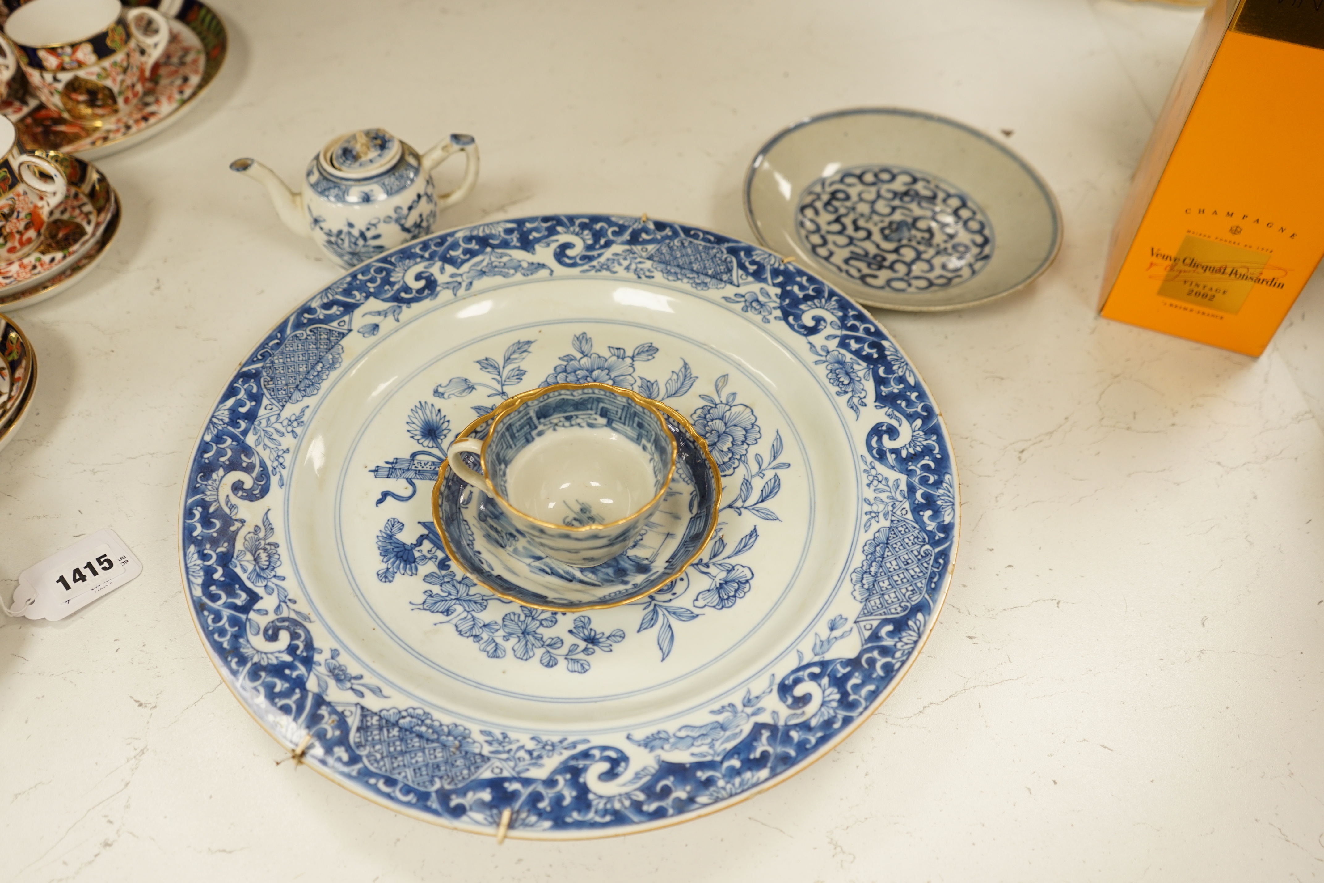 A Worcester teapot, c.1770, two 18th century Chinese porcelain dishes, a cup and saucer, a Chinese shallow bowl and a small teapot, largest dish 39cm